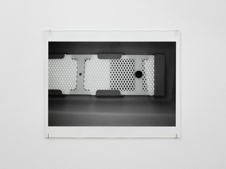 Olymp ventilation screen, Berlin, b, 2022, silver gelatin print, glass, pins, 30.35 x 40.7 cm